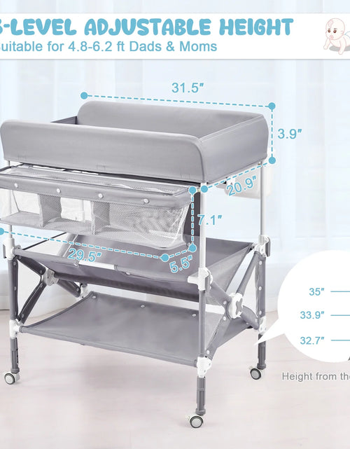 Load image into Gallery viewer, Portable Baby Changing Table with Wheels,Adjustable Height ,Foldable Diaper Change Table with Cleaning Bucket , Nursery Organizer &amp; 2 Tier Storage Rack, Infant Newborn Mobile Nursery Organizer
